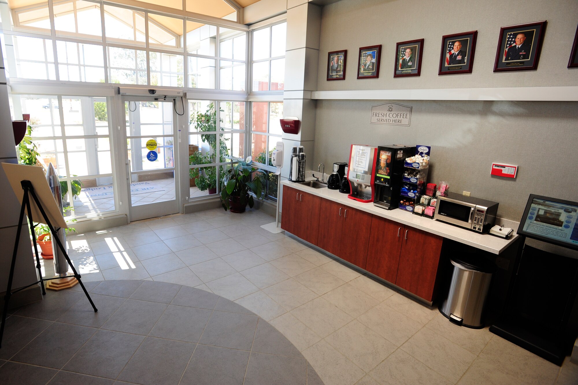 VANDENBERG AIR FORCE BASE, Calif. -- The lobby entrance of the new lodging office is pictured the day before its official ribbon cutting ceremony on August 20, 2013. The new facility gives the Vandenberg Lodging center a bigger, brighter building and provides a better first impression for guests and customers. (U.S. Air Force photo/Airman Yvonne Morales)