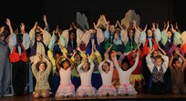 Children who participated in the weeklong Missoula Children’s Theatre program, hosted by
Joint Base San Antonio-Randolph Youth Programs, gather on stage after their performance
of “Jack and the Beanstalk” Aug. 16 at the Randolph Fleenor Auditorium. (U.S. Air Force photo by Don Lindsey)