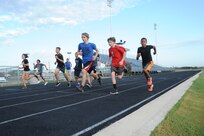 Randolph High School cross-country team athletes train for time during an early morning practice at the high school track Aug. 15 in preparation for their first meet of the 2013 season, Saturday. (U.S. Air Force photo by Rich McFadden)
