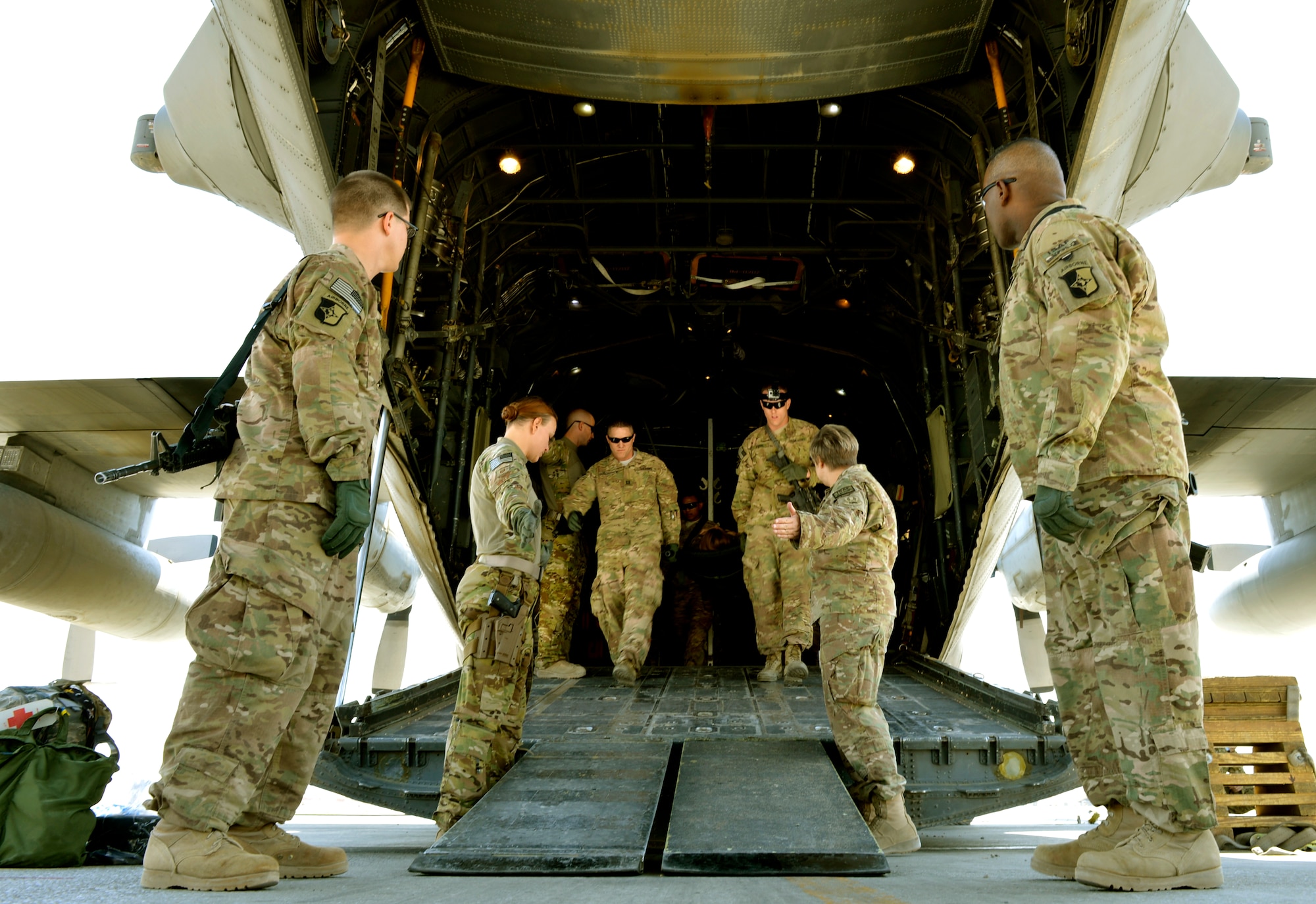 U.S. Army medics learn how to safely carry a litter loaded with a patient off a C-130 fixed aircraft at Bagram Airfield, Afghanistan, August, 22, 2013. There were ten Army medics in attendance. (U.S. Air Force photo/ Staff Sgt. Stephenie Wade)