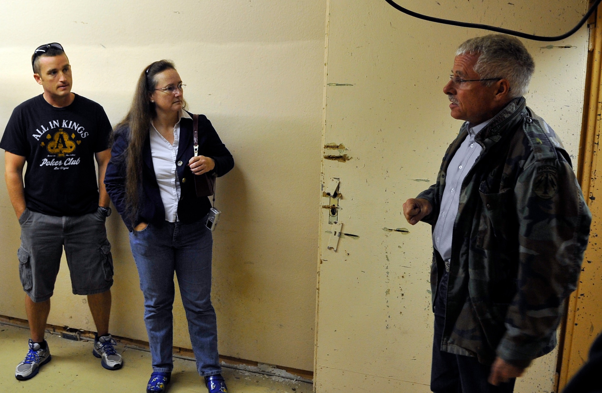 Wolfgang Wuermel, owner of the Kindsbach Cave, briefs members of the 603rd Air and Space Operations Center during a tour of the Air Defense Operations Center bunker, Aug. 16, 2013, Kindsbach Cave, Germany. The bunker was built prior to World War II and was utilized for command and control operations for the German army. After the war it was passed to the French, who used it primarily for storing munitions. The U.S. Air Force gained control of the bunker in 1954 and turned it back into a command and control center where air operations could have been led if the Cold War turned hot. (U.S. Air Force photo/Airman 1st Class Trevor Rhynes)