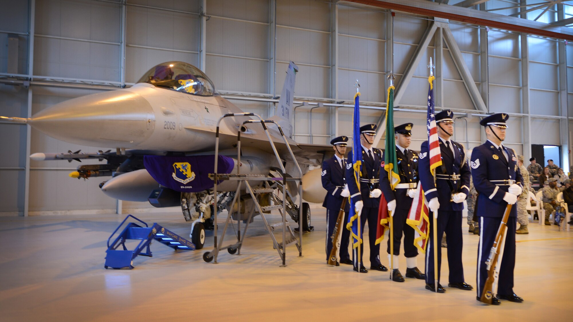 Aviano honor guard members stand at parade rest before a change of command
ceremony May 30, 2013, at Aviano Air Base, Italy.  The honor guard is
composed of hand-selected Airmen who provide support for ceremonies
throughout the base and southern Europe.  (U.S. Air Force photo/Staff Sgt.
Evelyn Chavez)
