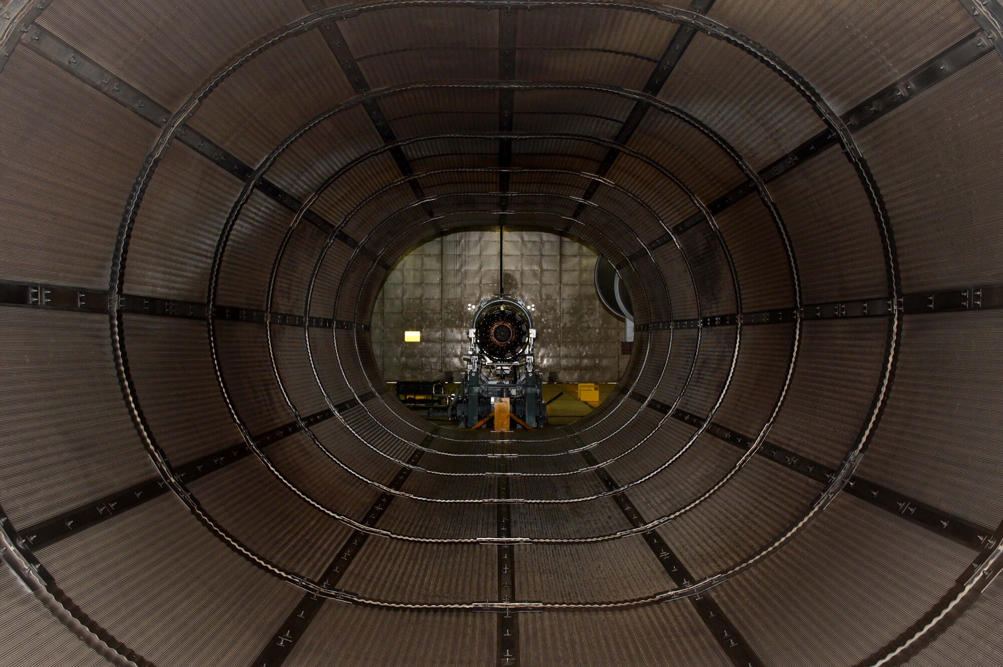 SPANGDAHLEM AIR BASE, Germany – An engine from an F-16 Fighting Falcon fighter aircraft sits on a thrust stand after a test run Aug. 12, 2013. This engine can produce 29,000 pounds of thrust. The 52nd Component Maintenance Squadron Propulsion Flight performs maintenance on engines from Spangdahlem and Aviano Air Base, Italy. (U.S. Air Force photo by Airman 1st Class Kyle Gese/Released) 