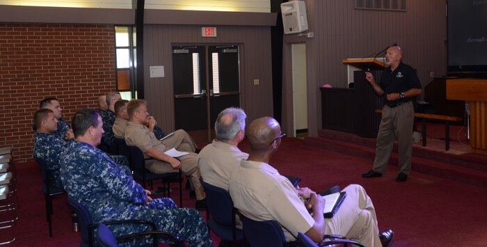 JOINT BASE CHARLESTON - WEAPONS STATION, S.C. — Stephen Thompson, associate professor and sexual aggression services director at Central Michigan University presents “No Zebras, No Excuses” training to Joint Base Charleston’s Navy tenant commands’  leadership at the Good Shepherd chapel, Aug. 7, 2013, at JB Charleston – Weapons Station, S.C. This training, sponsored by the Sexual Assault Prevention and Response Office, takes a different perspective, utilizing the behavior of the Zebras as an overarching theme for this bystander education.  In the wild, Zebras scatter when they are under attack and fail to defend the herd. The training event reminded all members of their duties to look after one another. (U.S. Navy photo/ Petty Officer 1st Class Chad Hallford)