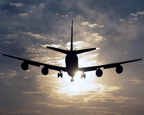 A KC-135 Stratotanker prepares to land in the early morning sunrise at Transit Center at Manas, Kyrgyzstan, August 22, 2013. Flight operations run seven days a week at the Transit Center to meet mission demands providing support for operations in Afghanistan. (U.S. Air Force photo/Staff Sgt. Robert Barnett)
