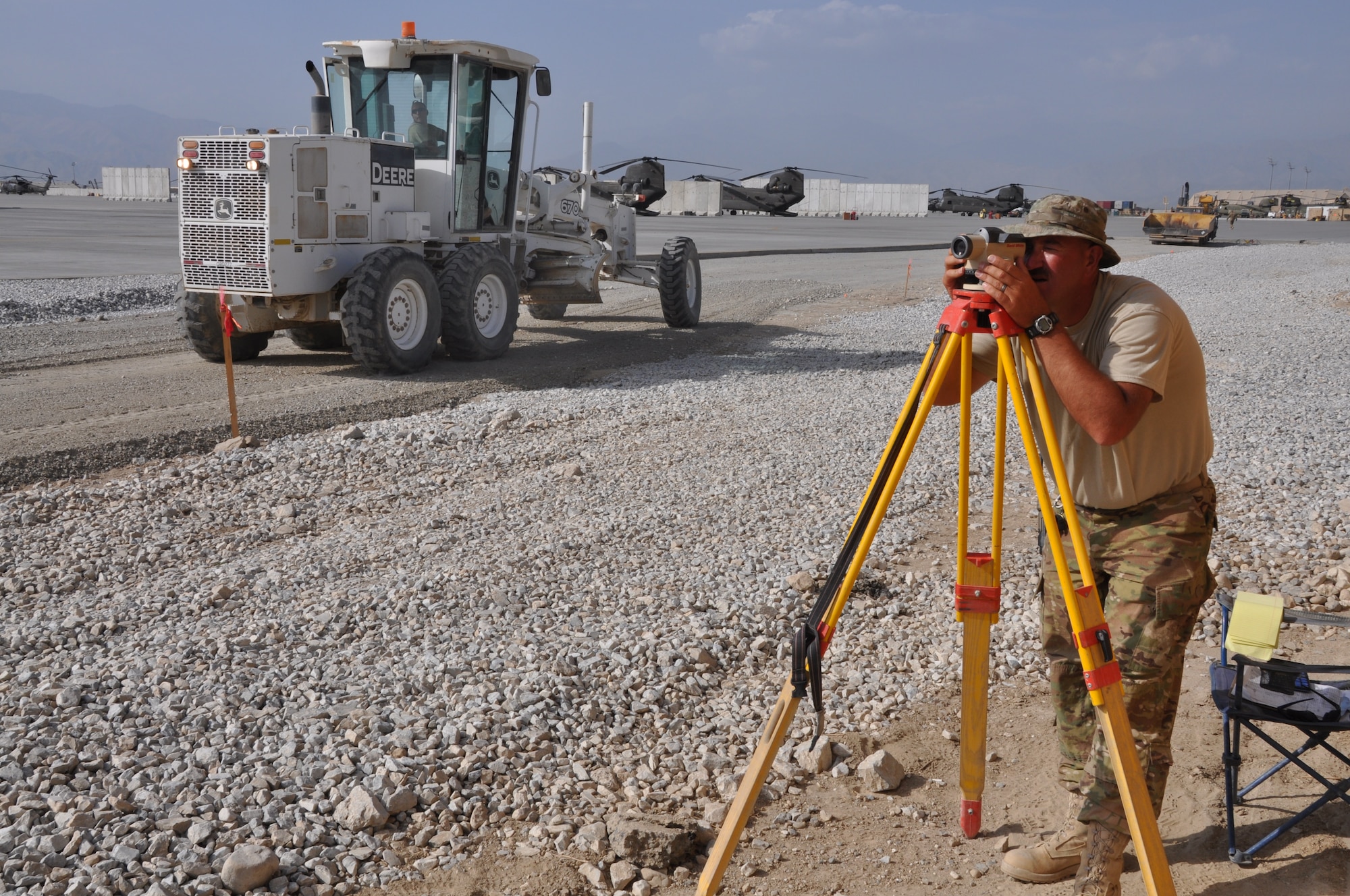 Master Sgt. Chad Sundstrom, 557th RED HORSE Squadron, deployed from Malmstrom Air Force Base, Mont., and native of Artesian, S.C., works on the perimeter flightline road construction project at Bagram Airfield, Afghanistan, that will be completed by the end of August. (U.S. Air Force photo/Tech. Sgt. Rob Hazelett)