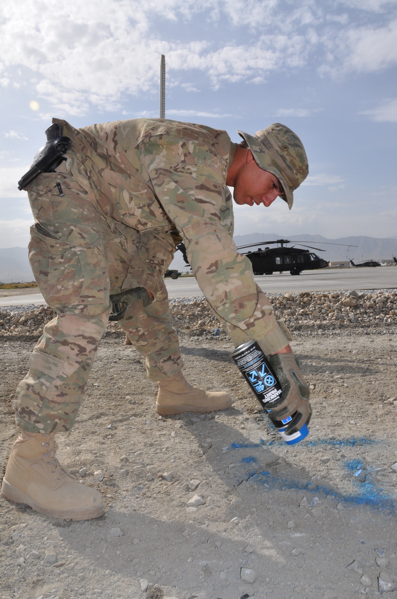 Airman 1st Class Andrew Diaz, 557th RED HORSE Squadron, is deployed from Malmstrom Air Force Base, Mont., and a native of Corona, Calif., is working on the perimeter flightline road construction project at Bagram Airfield, Afghanistan, Aug. 19. The project is scheduled to be completed by the end of August. (U.S. Air Force photo/Tech. Sgt. Rob Hazelett)