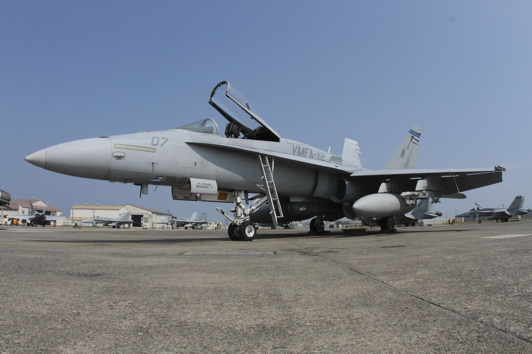 A VMFA-112 F/A-18 Hornet sits on the flight line here Aug. 16, 2013. Marine Fighter Attack Squadron 112 is scheduled to be in Iwakini for approximately six months.
