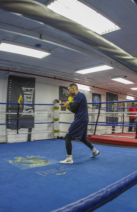 NEW YORK - Staff Sgt. Todd Dekinderen, a recruiter at Marine Corps Recruiting Substation Brooklyn, Recruiting Station New York, shadow boxes at the Sadam Ali Boxing Center in Brooklyn, Feb. 28.  Dekinderen is a Pontiac, Mich., native and aspires to become a professional boxer.  (U.S. Marine Corps photo by Sgt. Kristin E. Moreno).