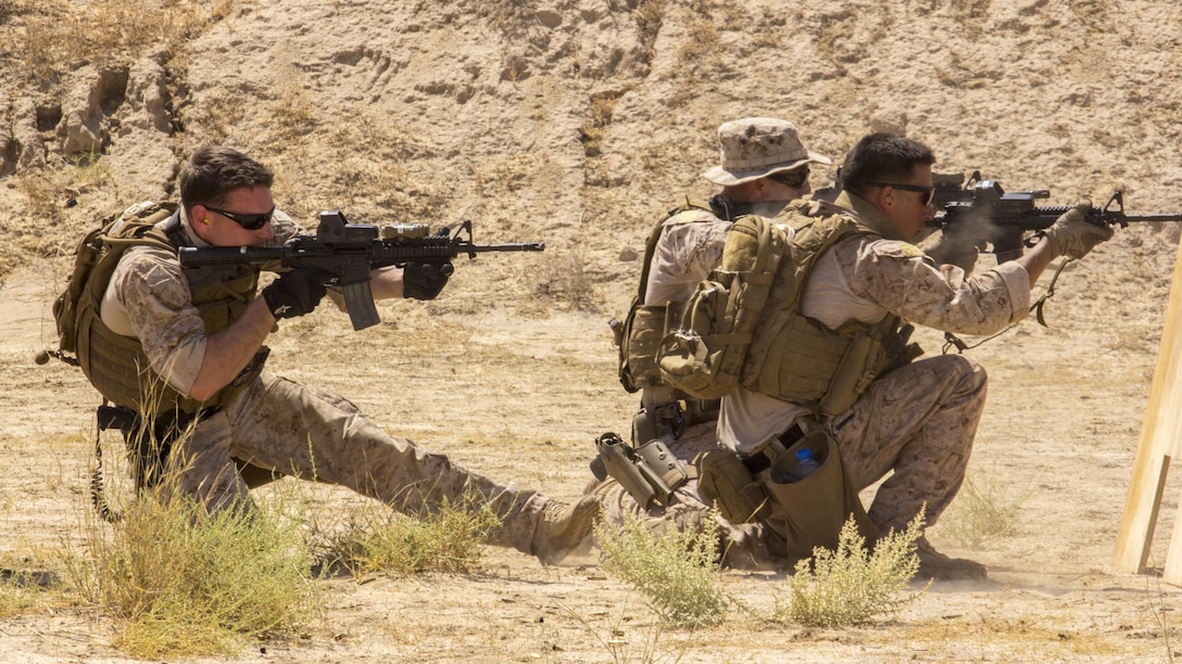 U.S. Marines assigned to Force Reconnaissance Platoon, Maritime Raid Force, 26th Marine Expeditionary Unit (MEU), engage targets with M4 Carbines during an advanced marksmanship range in the 5th Fleet area of responsibility, Aug. 19, 2013. The Marines conducted the range in 115 degree heat with a full combat load to acclimate themselves to harsh desert environments. The 26th MEU is a Marine Air-Ground Task Force forward-deployed to the U.S. 5th Fleet area of responsibility aboard the Kearsarge Amphibious Ready Group serving as a sea-based, expeditionary crisis response force capable of conducting amphibious operations across the full range of military operations. (U.S. Marine Corps photo by Sgt. Christopher Q. Stone, 26th MEU Combat Camera/Released)