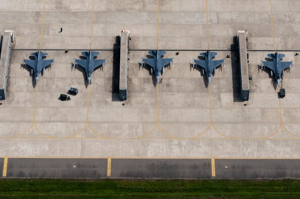 Maintainers from the 8th Fighter Wing prepare F-16 Fighting Falcons for training flights Aug. 15, 2013, at Kunsan Air Base, South Korea. Being ready at all times ensures Airmen are ready to complete the Kunsan AB mission. (U.S. Air Force photo/Senior Airman Armando A. Schwier-Morales)