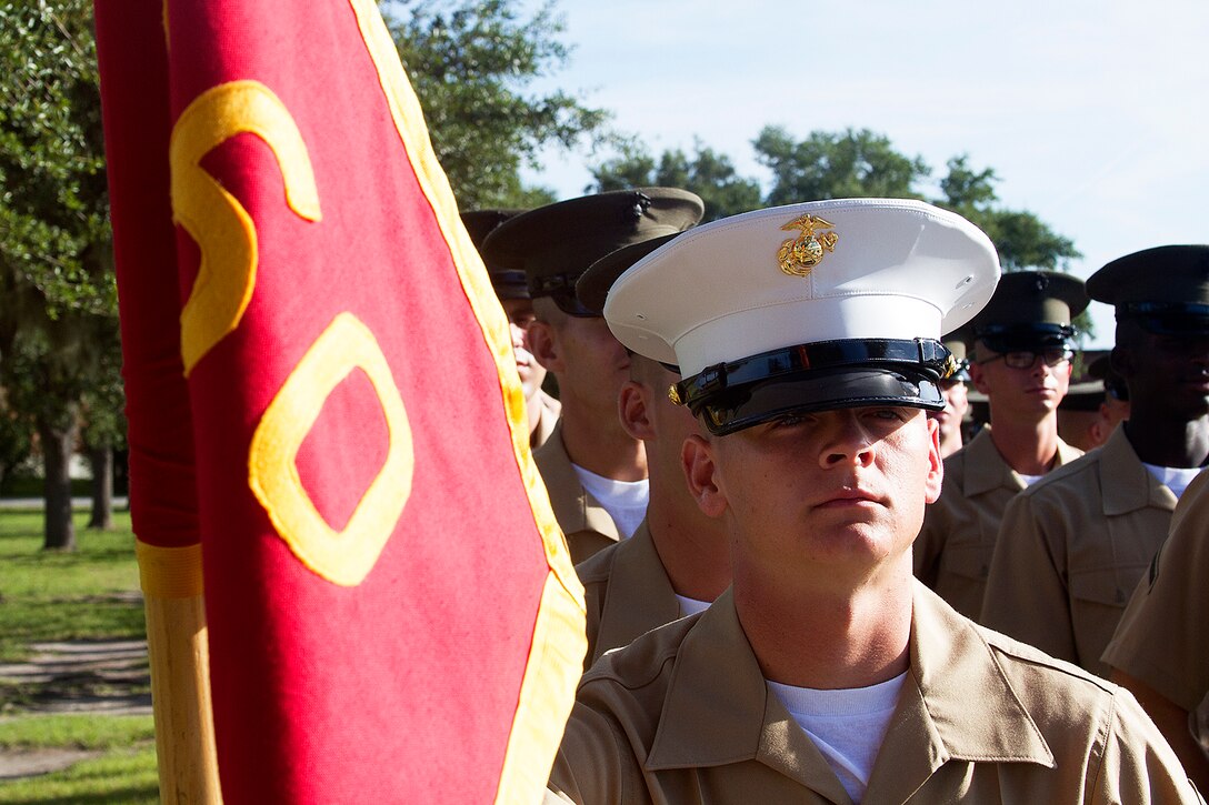 Pfc. Brandon Gauer, honor graduate for platoon 1060, stands at parade rest before graduation aboard Parris Island, S.C., Aug. 23, 2013. Gauer, a native of Phoenix City, Ala., was recruited by Staff Sgt. Byron Bacon, recruiter from Recruiting Substation Montgomery, Recruiting Station Montgomery. Gauer will be able to enjoy some much deserved leave with his family after graduation. (U.S. Marine Corps photo by Lance Cpl. John-Paul Imbody)
