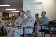 Col. Terrence O’Connell (front left), Brig. Gen. Edward Banta (center), Rear Adm. Charles Harr (front right), Navy Capt. David Lane (rear left), and Cmdr. Stephen Shaw (rear right) were some of the distinguished guests present at a ribbon cutting ceremony at the French Creek Medical Clinic aboard Camp Lejeune N.C., Aug. 22, 2013. The ceremony symbolized the clinic’s official establishment as one of six pilot sites for the Marine Centered Medical Home, which aims to revolutionize the health care available to Marines and sailors in a garrison environment. (U.S. Marine Corps photo by Lance Cpl. Shawn Valosin)