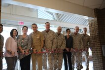 Marines and sailors with Combat Logistics Regiment 25, 2nd Marine Logistics Group participated in a ribbon cutting ceremony at the French Creek Medical Clinic aboard Camp Lejeune, N.C., Aug. 22, 2013. Guests included Rear Adm. Charles Harr, Brig. Gen. Edward Banta, Col. Terrence O’Connell, and Navy Capt. David Lane. (U.S. Marine Corps photo by Lance Cpl. Shawn Valosin)