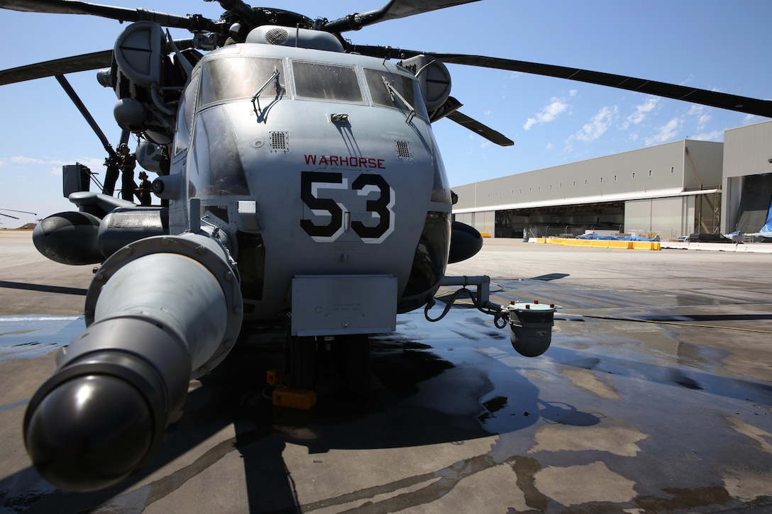 A CH-53E Super Stallion with Marine Heavy Helicopter Squadron 465 "Warhorses" dries in the sun after being washed aboard Marine Corps Air Station Miramar, Calif., Aug. 20. The Warhorses deployed five aircraft to Colorado Springs during a deployment for training in order to break the squadron's Marines and pilots out of their comfort zones and normal flight patterns.