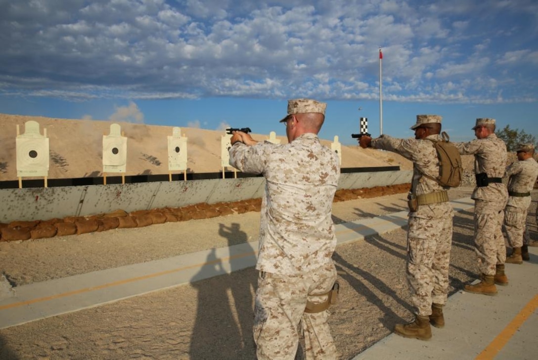 Marines with Marine Corps Logistics Base Barstow fire on the seven-yard line during a M9 pistol pre-qualification at the base’s rifle and pistol range, Aug. 22. The base offers more than 2,400 acres to units in the southwest region. It also houses a 1,000-yard rifle range as well as a pistol and shotgun range.  The ranges provide sustainment and qualification training for service members and provide a unique environment for local law enforcement agencies to hone their skills. 