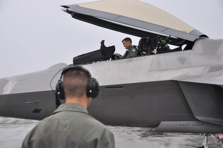 Maj. Caleb Haley, Reserve F-22 pilot assigned to the 302nd Fighter Squadron, prepares to fly a Red Flag Alaska sortie here August 22. Before becoming a Reservist Haley was an active duty aggressor pilot and flew in 10 Red Flags. This was Haley's first Red Flag as blue air F-22 pilot.  (U.S. Air Force/Tech. Sgt. Dana Rosso)