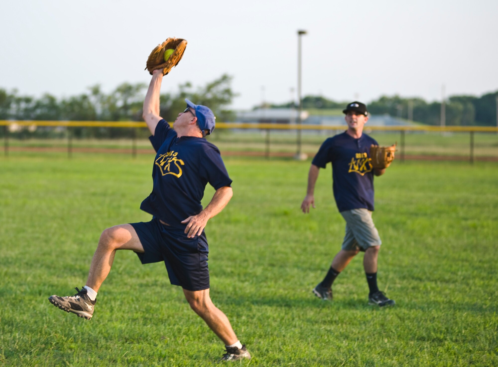 Master Sgt. Cliff Needles, 22nd Aircraft Maintenance Squadron section chief, makes the game winning catch during the base intramural softball championship Aug. 21, 2013, at McConnell Air Force Base Kan. The 22nd AMXS defeated the 22nd Maintenance Squadron team, 10-4. (U.S. Air Force photo/Airman 1st Class John Linzmeier)