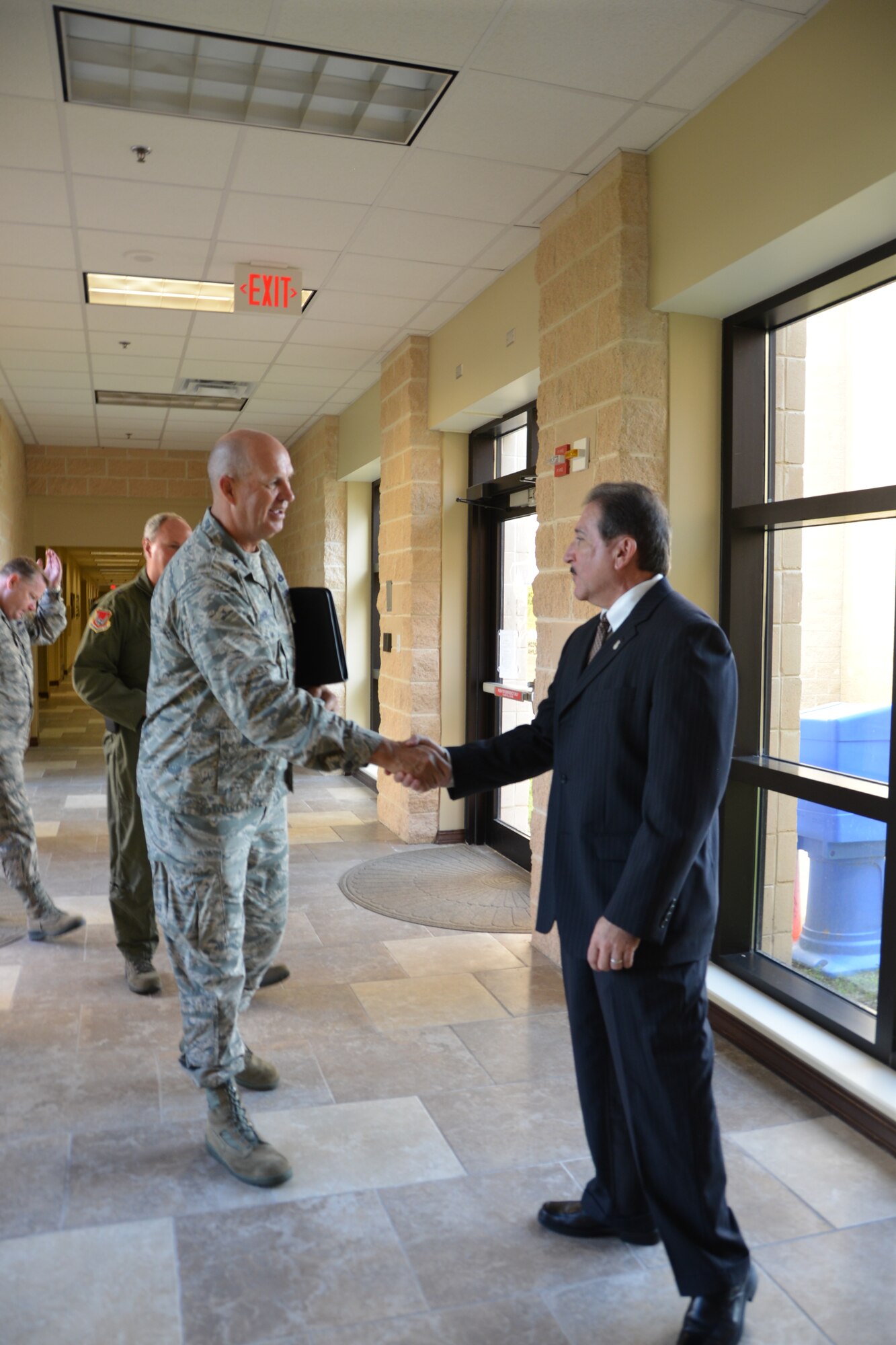 Mr. Rodney Simmons, AFNORTH National Security Emergency Preparedness Directorate, greets Brig. Gen. Donald Johnson, Tennessee National Guard assistant Adjutan General, prior to a series of meeting to gain a better understanding  Title 10 resources that could be available if needed in a catastrophic-type event.