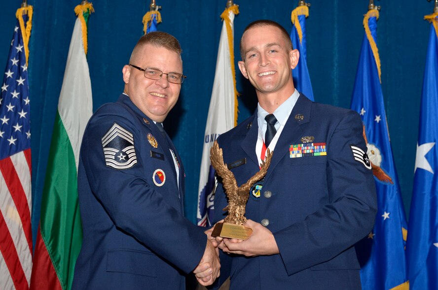 McGHEE TYSON AIR NATIONAL GUARD BASE, Tenn. - Senior Airman Chad Cosgrove, from the Vermont Air National Guard, right, receives the leadership award for Airman Leadership School Class 13-6 at the I.G. Brown Training and Education Center here, from Chief Master Sgt. Donald E. Felch, left, commandant at the Paul H. Lankford Enlisted Professional Military Education Center, Aug. 15, 2013.  The award is presented to the student who made the most significant contribution to the overall success of the class by demonstrating superior leadership abilities and excellent skills as a team member.  It is named in honor of Chief Master Sgt. Paul H. Lankford, a Bataan Death March survivor and the first commandant of the Air National Guard Enlisted Professional Military Education Center. (U.S. Air National Guard photo by Master Sgt. Kurt Skoglund/Released)