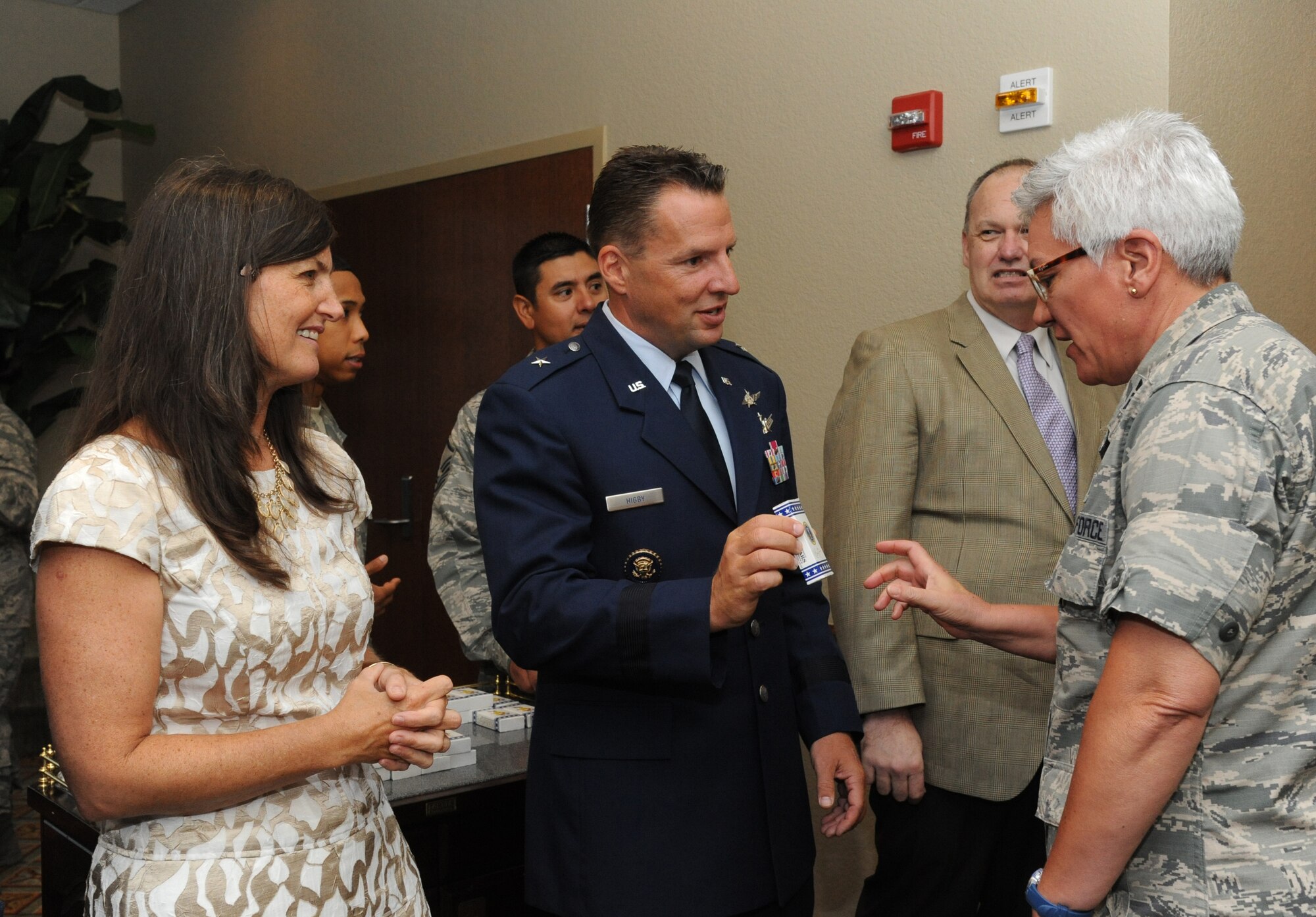 Brig. Gen. Patrick Higby, incoming 81st Training Wing commander, (center), and his wife are welcomed by Col. Anna Schulte, 403rd Maintenance Group commander, in the receiving line following the 81st Training Wing change of command ceremony Aug. 23, 2013, at the Bay Breeze Event Center, Keesler Air Force Base, Miss.  Higby accepted command from Brig. Gen. Brad Spacy, outgoing 81st TRW commander, who has been selected for a new assignment as director for logistics, installations and mission support at Headquarters United States Air Forces in Europe, Ramstein Air Base, Germany.  Maj. Gen. Leonard Patrick, 2nd Air Force commander, was the presiding officer for the event.  (U.S. Air Force photo by Kemberly Groue)