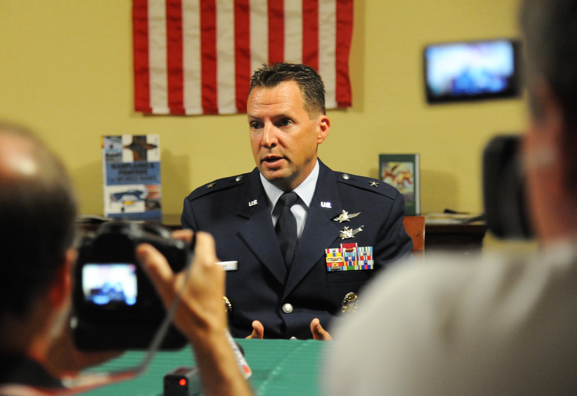 Brig. Gen. Patrick Higby, incoming 81st Training Wing commander, is interviewed by local media following the 81st Training Wing change of command ceremony Aug. 23, 2013, at the Bay Breeze Event Center, Keesler Air Force Base, Miss.  Higby accepted command from Brig. Gen. Brad Spacy, outgoing 81st TRW commander, who has been selected for a new assignment as director for logistics, installations and mission support at Headquarters United States Air Forces in Europe, Ramstein Air Base, Germany.  Maj. Gen. Leonard Patrick, 2nd Air Force commander, was the presiding officer for the event.  (U.S. Air Force photo by Kemberly Groue)