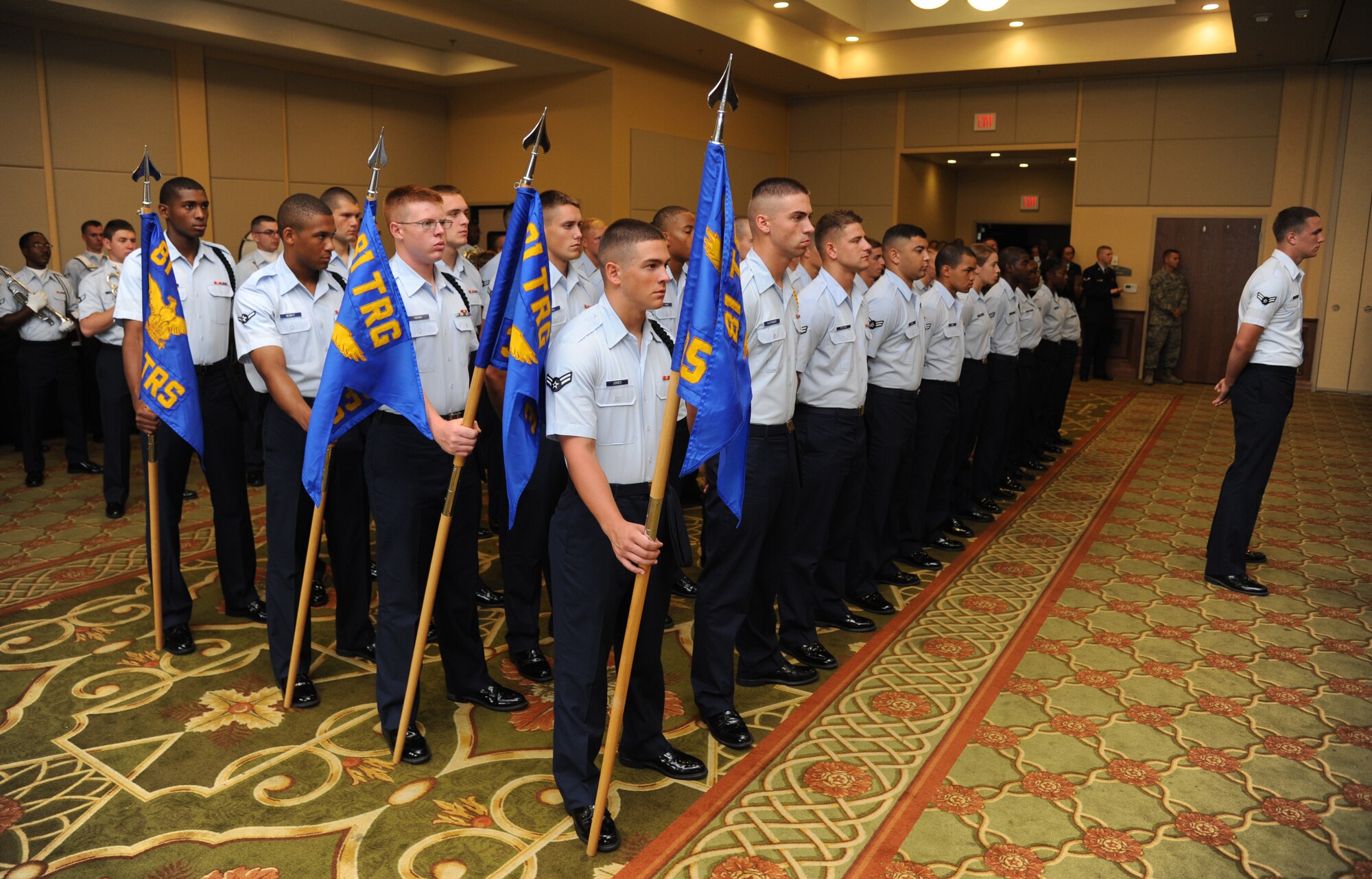 Airmen from the 81st Training Group stand at ease during the 81st Training Wing change of command ceremony Aug. 23, 2013, at the Bay Breeze Event Center, Keesler Air Force Base, Miss.  Brig. Gen. Brad Spacy, outgoing 81st TRW commander, passed command to Brig. Gen. Patrick Higby, incoming 81st TRW commander, with Gen. Leonard Patrick, 2nd Air Force commander, as the presiding officer.  Spacy has been selected for a new assignment as director for logistics, installations and mission support at Headquarters United States Air Forces in Europe, Ramstein Air Base, Germany.  (U.S. Air Force photo by Kemberly Groue)