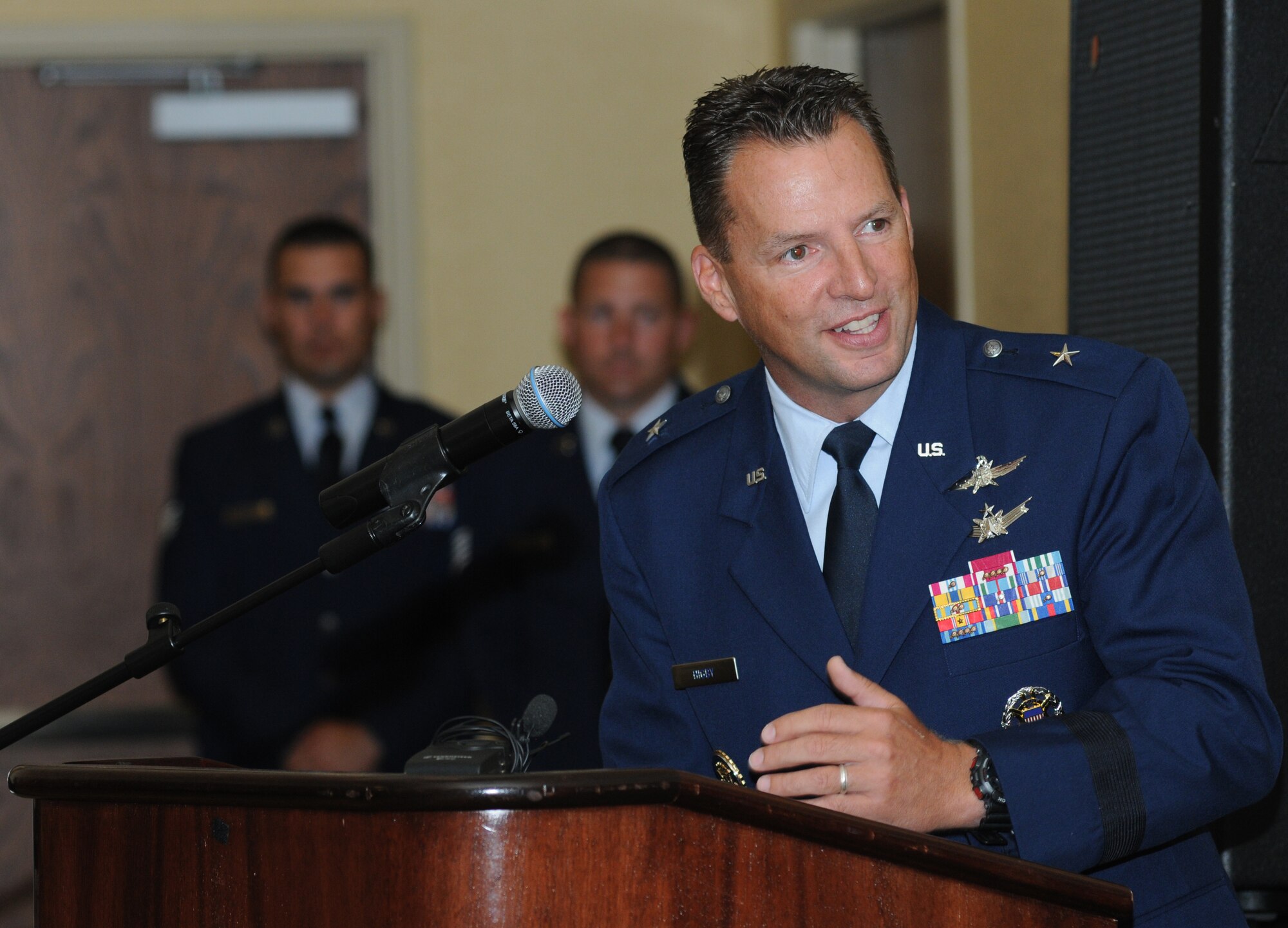 Brig. Gen. Patrick Higby, incoming 81st Training Wing commander, delivers remarks during a change of command ceremony Aug. 23, 2013, at the Bay Breeze Event Center, Keesler Air Force Base, Miss.  Higby accepted command from Brig. Gen. Brad Spacy, outgoing 81st TRW commander, who has been selected for a new assignment as director for logistics, installations and mission support at Headquarters United States Air Forces in Europe, Ramstein Air Base, Germany.  Maj. Gen. Leonard Patrick, 2nd Air Force commander, was the presiding officer for the event with more than 200 community leaders and military guests in attendance.  (U.S. Air Force photo by Kemberly Groue)