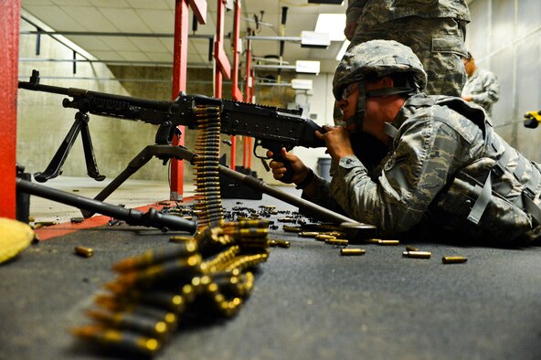Airman 1st Class Julius Prefontaine-Gomez, 56th SFS, fires the M-240B machine gun during training. (U.S. Air Force photo/Senior Airman David Owsianka)