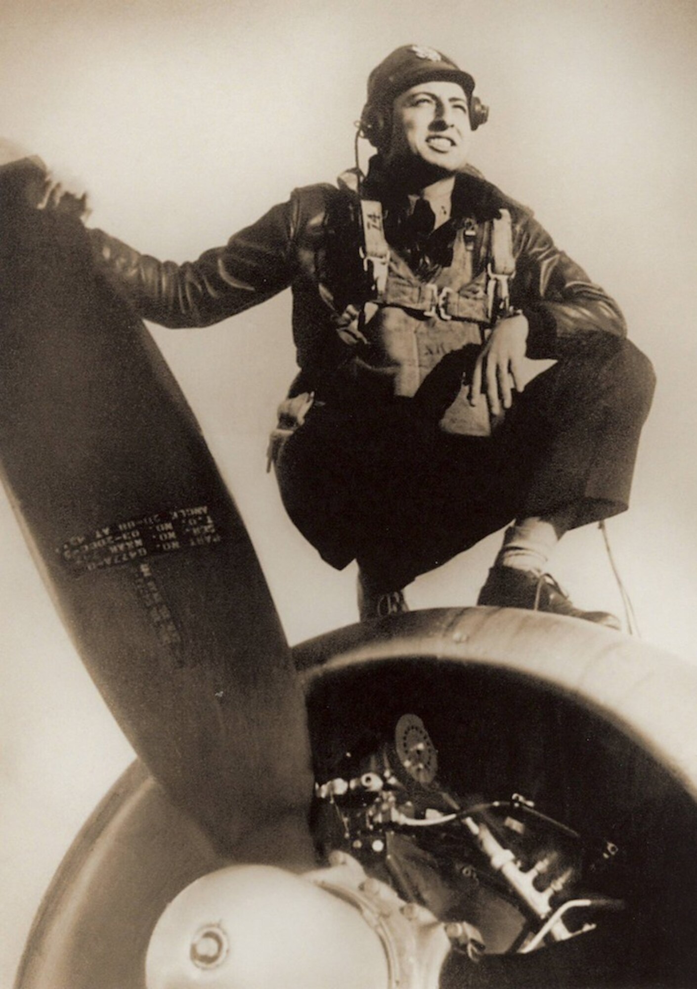 Winston is shown here kneeling on his B-17 in 1944 at Royal Air Force Station Watton, England. He was a member of the 391st Bomb Group. (Courtesy photo)