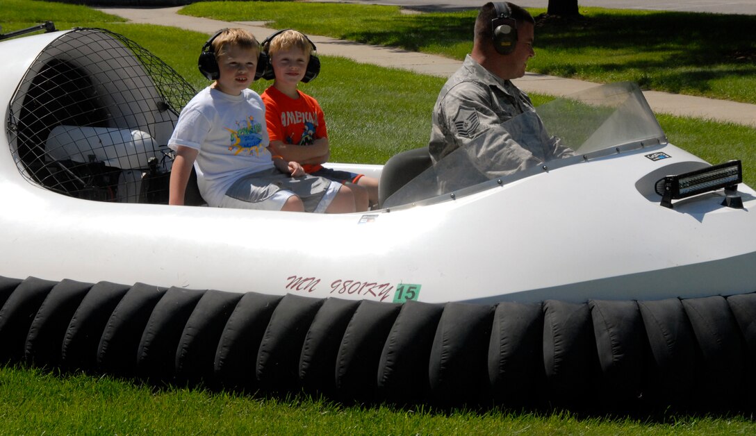 Children of Airmen from the 133rd Airlift Wing ride a hovercraft, one of many different activities offered during Family Day in St. Paul, Minn., Aug. 17, 2013. Family Day is an annual event that recognizes the families and thanks them for their support to the Airmen.
(U.S. Air National Guard photo by Tech. Amy M. Lovgren/Released)
