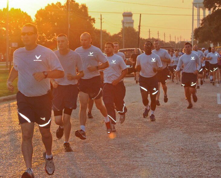 Airmen participate in a 5K fun-run on Barksdale Air Force Base, La., Aug. 23, 2013. The Senior Airman Bryan Bell Fitness Center hosted a monthly 5K that more than 100 runners attended. (U.S. Air Force photo/Senior Airman Kristin High) 

