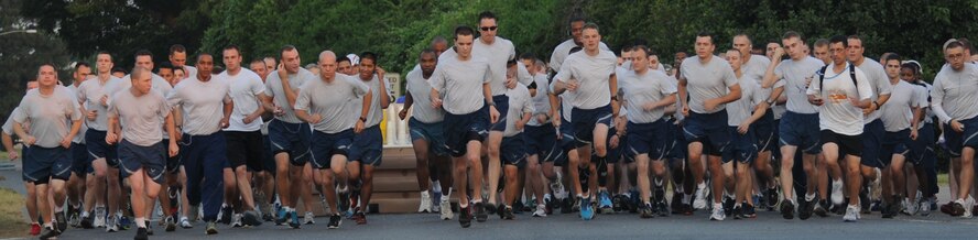 Airmen begin a 5K fun-run on Barksdale Air Force Base, La., Aug. 23, 2013. The Senior Airman Bryan Bell Fitness Center hosts a 5K fun-run each month to promote fitness, health and welfare to Airmen. Prizes are given to the 1st and 2nd place males and females and a raffle is also held for all the runners. (U.S. Air Force photo/Senior Airman Kristin High)