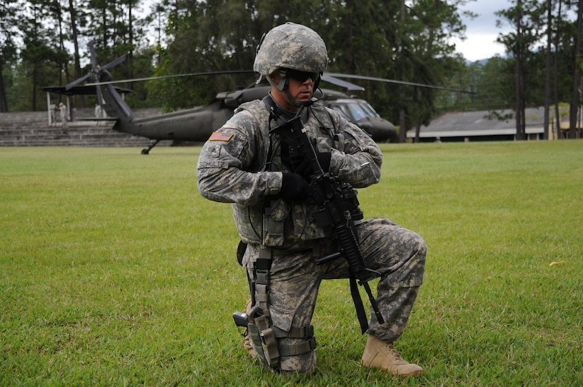 U.S. Army Sgt. Zachary Schultz, Joint Security Forces patrolman, post security during a off base downed aircraft exercise Aug. 21, 2013. The purpose of the exercise is to train and validate JTF-B personnel and Honduran Response Force on aircraft accident response procedures by conducting a simulated aircraft accident. (Photo released by U.S. Air Force Staff Sgt. Jarrod Chavana)