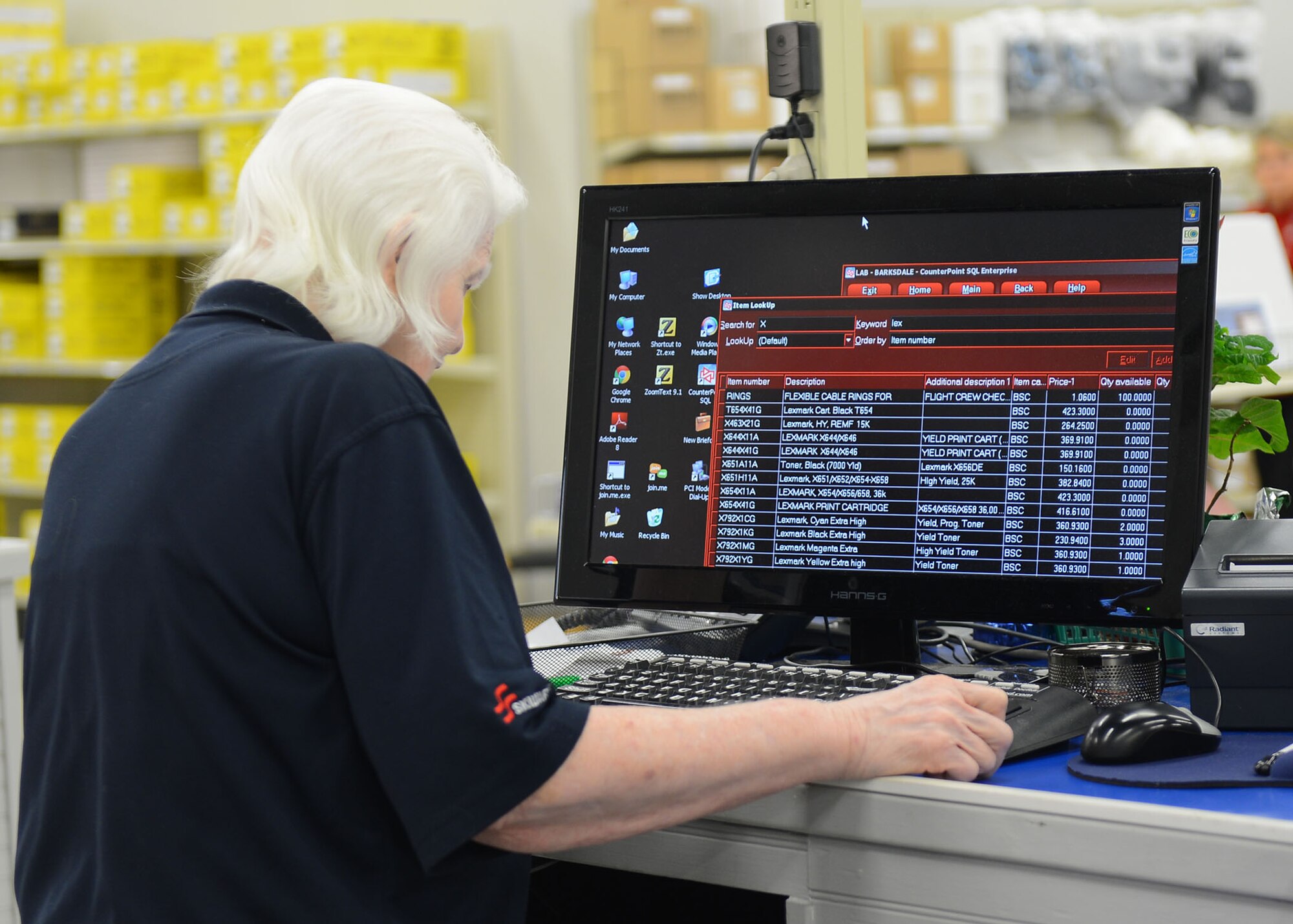 Barbara Lucht, Base Supply Center employee, pre-orders toner cartridges for customers on Barksdale Air Force Base, La., Aug. 22, 2013. Lucht is a member of the Louisiana Association for the Blind, an organization contracted by the base to run the store and has been an employee for more than 40 years. The BSC is the official distributor for the base, providing team Barksdale with anything from office supplies to deployment gear. (U.S. Air Force photo/Senior Airman Joseph A. Pagán Jr.)