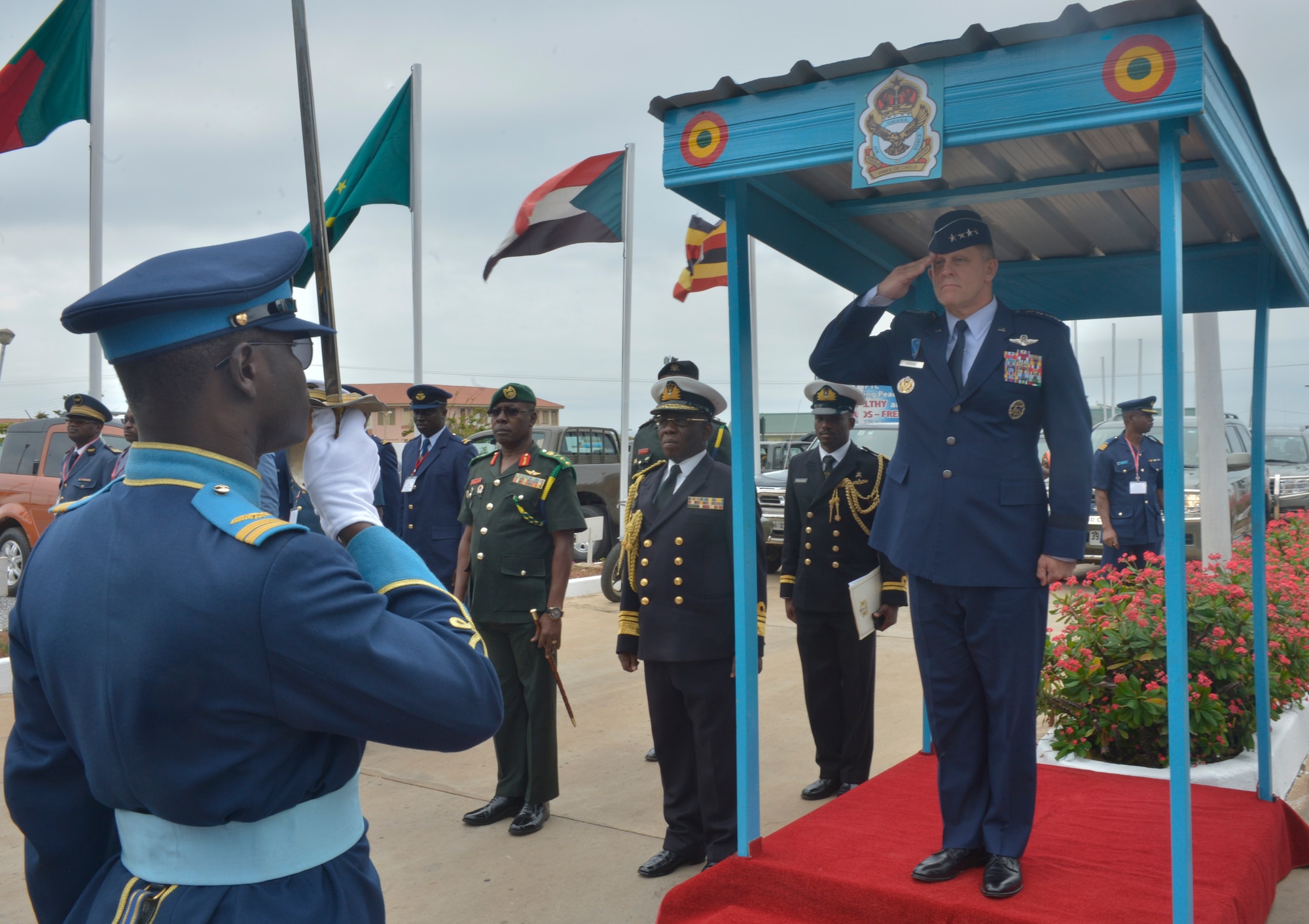 Gen. Frank Gorenc, U.S. Air Forces in Europe and Air Forces Africa commander, 
salutes the Ghanaian air force guard of honor sword bearer, Aug. 20, 2013, 
Accra, Ghana. The Ghanaian air force opened the 2013 Regional Air Chiefs 
Symposium with a traditional troop guard ceremony to honor the senior ranking 
officer in attendance. (U.S. Air Force photo by Airman 1st Class Jordan 
Castelan/Released)