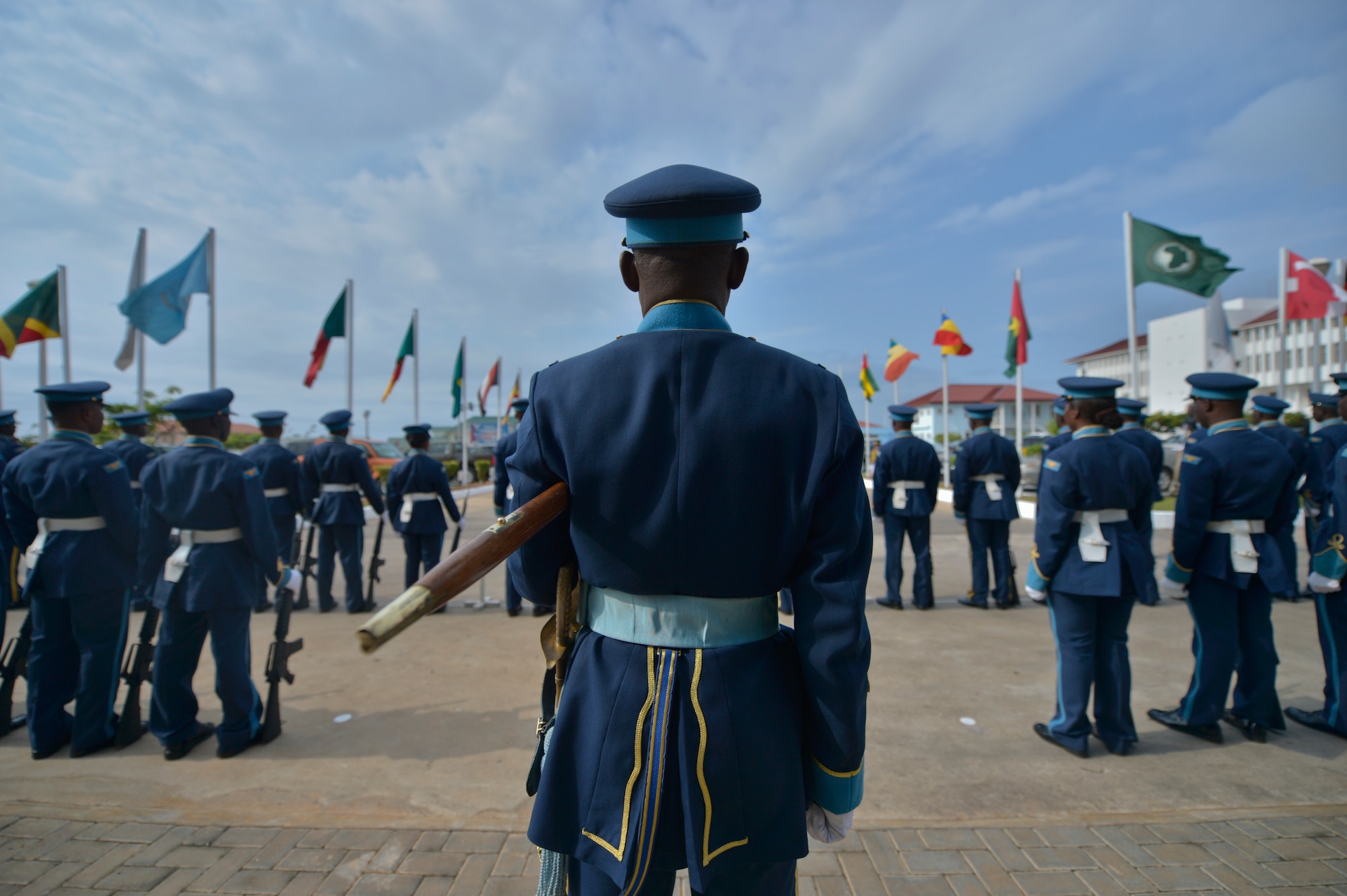 The Ghanaian air force guard of honor awaits the arrival of the 2013 Regional 
Air Chiefs Symposium official party, Aug. 20, 2013, Accra, Ghana. The Ghanaian 
air force opened the 2013 Regional Air Chiefs Symposium with a traditional 
troop guard ceremony to honor the senior ranking officer in attendance. (U.S. 
Air Force photo by Airman 1st Class Jordan Castelan/Released)
