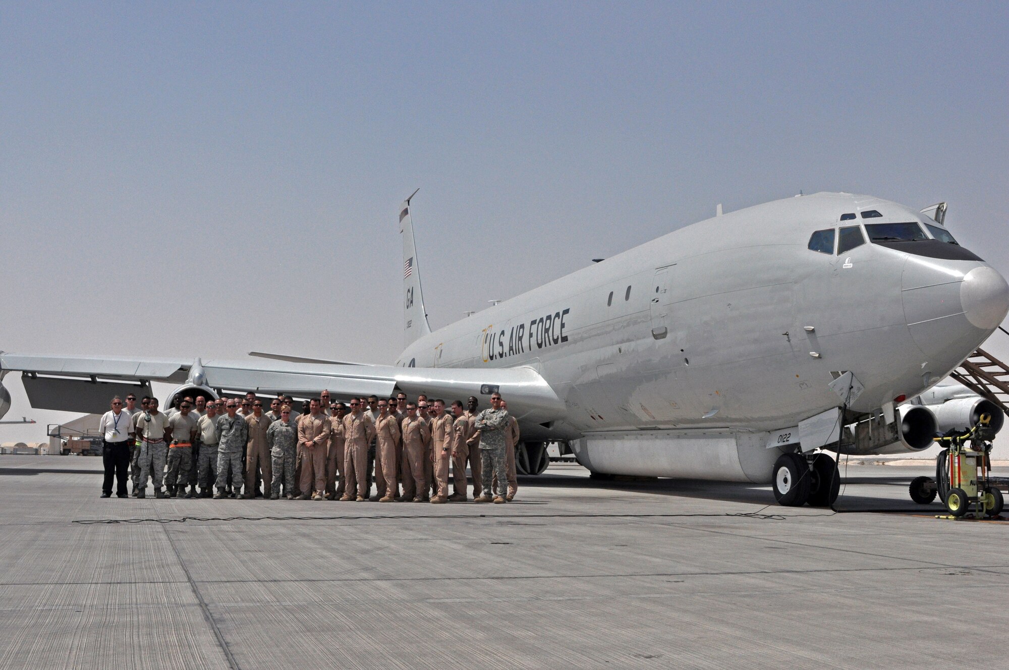 E-8C Joint Surveillance Target Attack Radar System aircrew, mission crew and maintainers pose with leadership of the 7th Expeditionary Airborne Command and Control Squadron after reaching a milestone of 85,000 hours in the U.S. Central Command area of responsibility August 17, 2013. The squadron has flown the JSTARS an average of 19.4 hours each day since events following 9/11, or the equivalent of being airborne continuously for almost 10 years. (U.S. Air Force photo/1st Lt. Susan Harrington)
