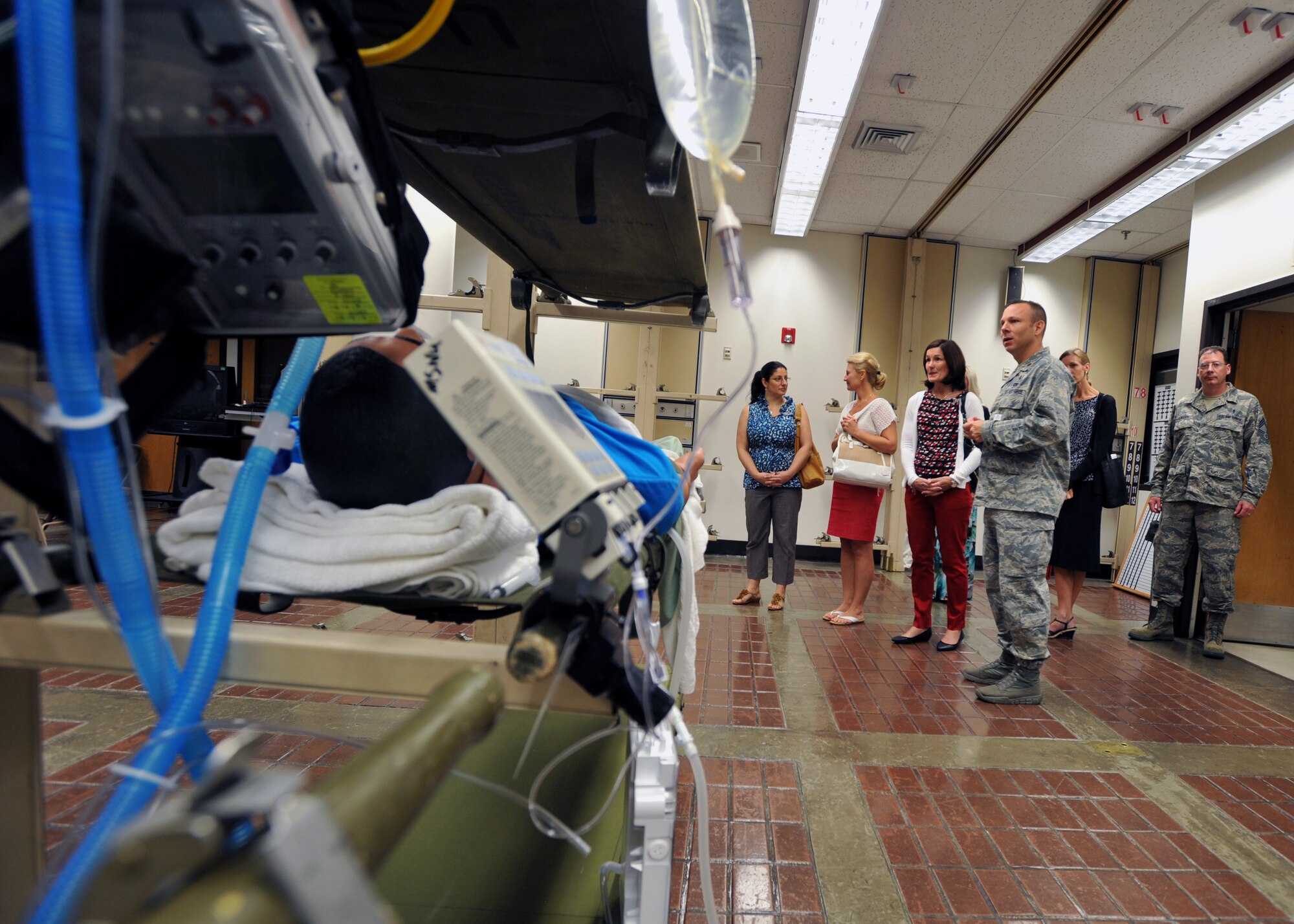 Betty Welsh, wife of Air Force Chief of Staff Gen. Mark A. Welsh III, and Athena Cody, wife of Chief Master Sgt. of the Air Force James A. Cody, receive a briefing during a tour of the 51st Medical Group hospital at Osan Air Base, Republic of Korea, Aug. 23, 2013. Welsh and Cody joined their husbands to see Team Osan’s mission firsthand, thank Airmen for their continued service and dedication, and discuss challenges and opportunities for Airmen and their families in the Pacific. (U.S. Air Force photo/Senior Airman Siuta B. Ika)
