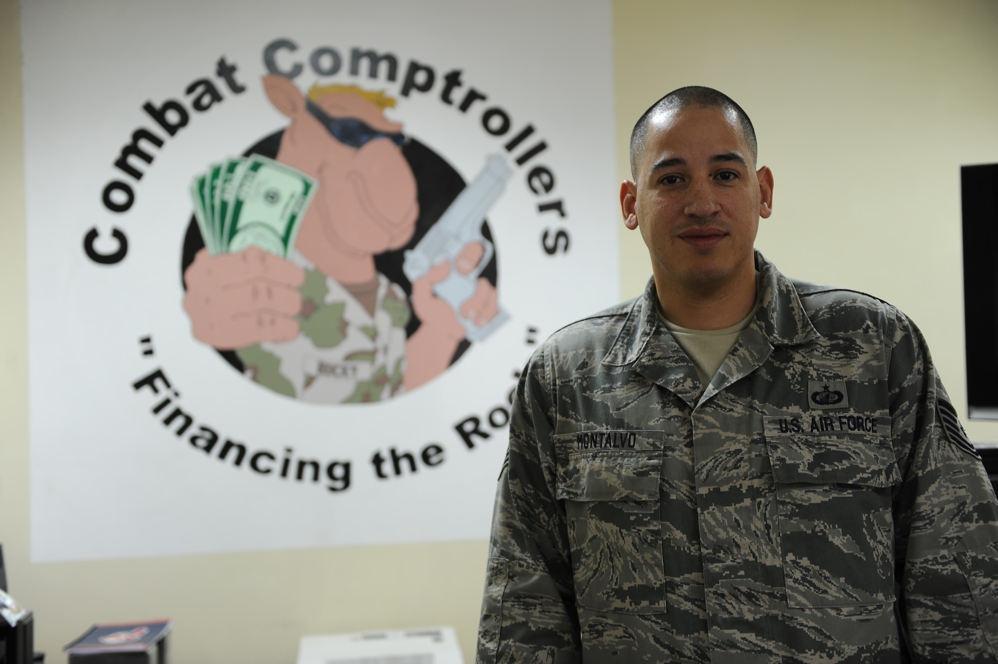 Tech. Sgt. Angel Montalvo is a paying agent deployed to the 386th Air Expeditionary Wing from Peterson Air Force Base, Colo.  He exercises oversight of Air Force cash operations to include military pay, travl pay and vendor payments.  Montalvo cites the heat as the most unique part of this, his fourth deployment.  He has been selected by his leadership as this week's Rock Solid Warrior.  (U.S. Air Force photo by Master Sgt. Christopher Campbell) 