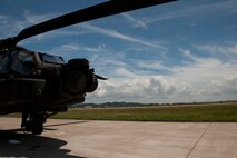 KUNSAN AIR BASE, Republic of Korea -- Soldiers from the 4th Aerial Reconnaissance Battalion (Attack), 2nd Aviation Regiment, Camp Humphreys, Republic of Korea, fly over Kunsan Air Base, ROK, Aug. 15, 2013. Several helicopters from Humphreys came to the Wolf Pack to conduct live-fire training at a local firing range. (U.S. Air Force photo by Senior Airman Armando A. Schwier-Morales/ Released)