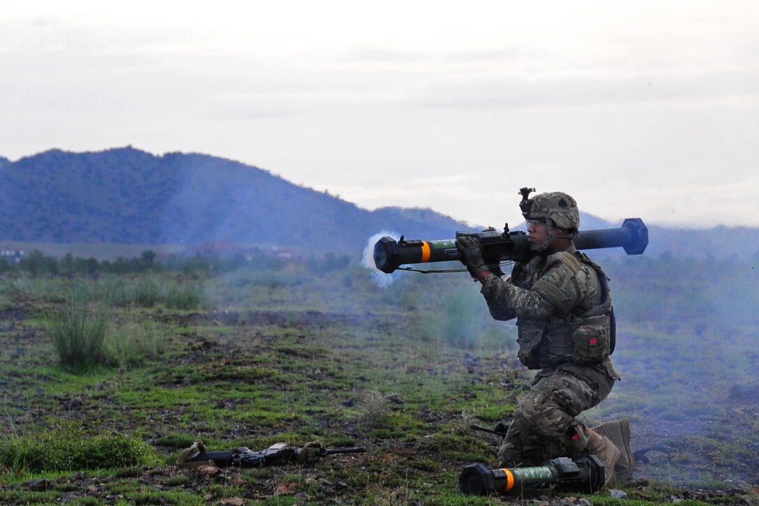 U.S. Army Spc. Juan Marte fires a shoulder-launched assault weapon at the heavy weapons range on Forward Operating Base Salerno, Khowst province, Afghanistan, August 14, 2013. Marte is assigned to the 101st Airborne Division's 2nd Battalion, 506th Infantry Regiment, 4th Brigade Combat Team.