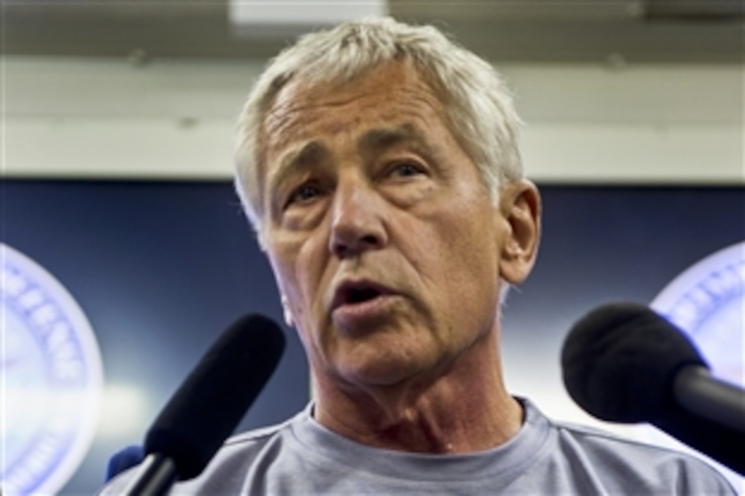 Defense Secretary Chuck Hagel briefs the press aboard a military aircraft on his way to Malaysia where he will meet with Malaysian leaders, including Prime Minister Najib Razak and Defense Minister Hishammuddin Tun Hussein. During the briefing, Hagel responded to questions on the crisis in Syria.  