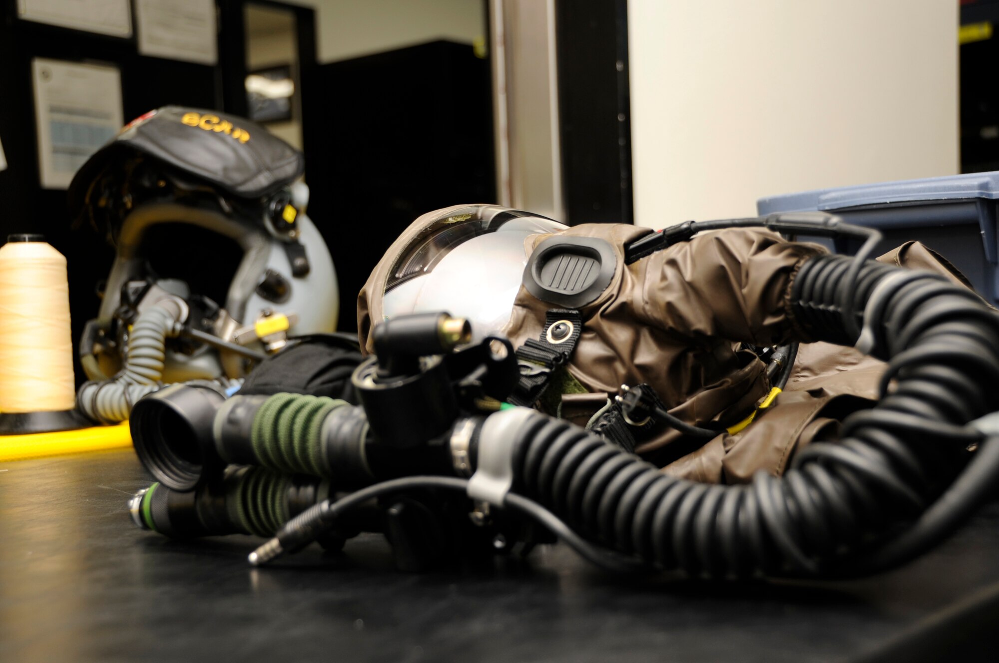 An Air Eye Repertory Protection mask is laid out for inspection at Misawa Air Base, Japan, Aug. 22, 2013. The AERP masks must be fitted to each pilot and are designed for protection during a contingency involving chemical attacks. (U.S. Air Force photo by Airman 1st Class Kaleb Snay)