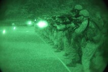 Marines fire their M16A4 service rifles while using night vision goggles and advanced target pointer illuminator aiming lights during an intermediate combat rifle marksmanship course of fire Aug. 13 at Range 13 near Camp Schwab. Throughout the night, the Marines conducted multiple live-fire drills, including shooting controlled pairs and failure-to-stop drills, paired with pivots and forward movement. The Marines are with 3rd Maintenance Bn., CLR-35, 3rd MLG, III MEF.