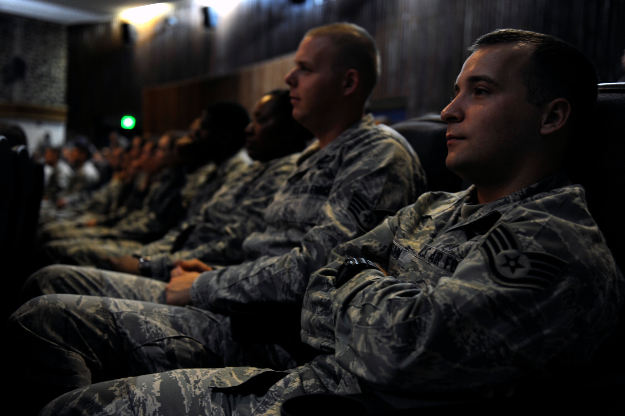 U.S. Air Force Airmen from Kadena Air Base, Japan, listen to Air Force Chief of Staff Gen. Mark A. Welsh III and Chief Master Sgt. of the Air Force James Cody during their visit to the 18th Wing Aug. 21, 2013. During their visit to Kadena, Welsh and Cody visited several units around the base and hosted an Airman’s call with 18th Wing Airmen, where they awarded five Distinguished Flying Crosses with valor. Welsh and Cody visited Kadena as part of a two-week visit to the region to thank Airmen and their families and discuss challenges and opportunities in the Pacific. (U.S. Air Force photo by Senior Airman Maeson L. Elleman/Released)
