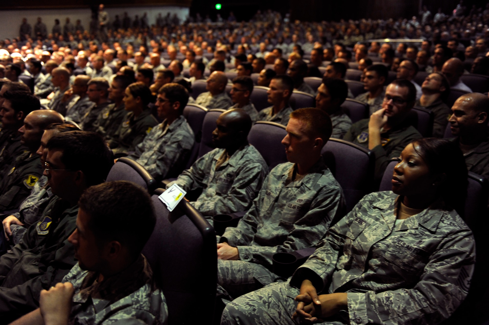 U.S. Air Force Airmen from Kadena Air Base, Japan, listen to Air Force Chief of Staff Gen. Mark A. Welsh III and Chief Master Sgt. of the Air Force James Cody during their visit to the 18th Wing Aug. 21, 2013. During their visit to Kadena, Welsh and Cody visited several units around the base and hosted an Airman’s call with 18th Wing Airmen, where they awarded five Distinguished Flying Crosses with valor. Welsh and Cody visited Kadena as part of a two-week visit to the region to thank Airmen and their families and discuss challenges and opportunities in the Pacific. (U.S. Air Force photo by Senior Airman Maeson L. Elleman/Released)