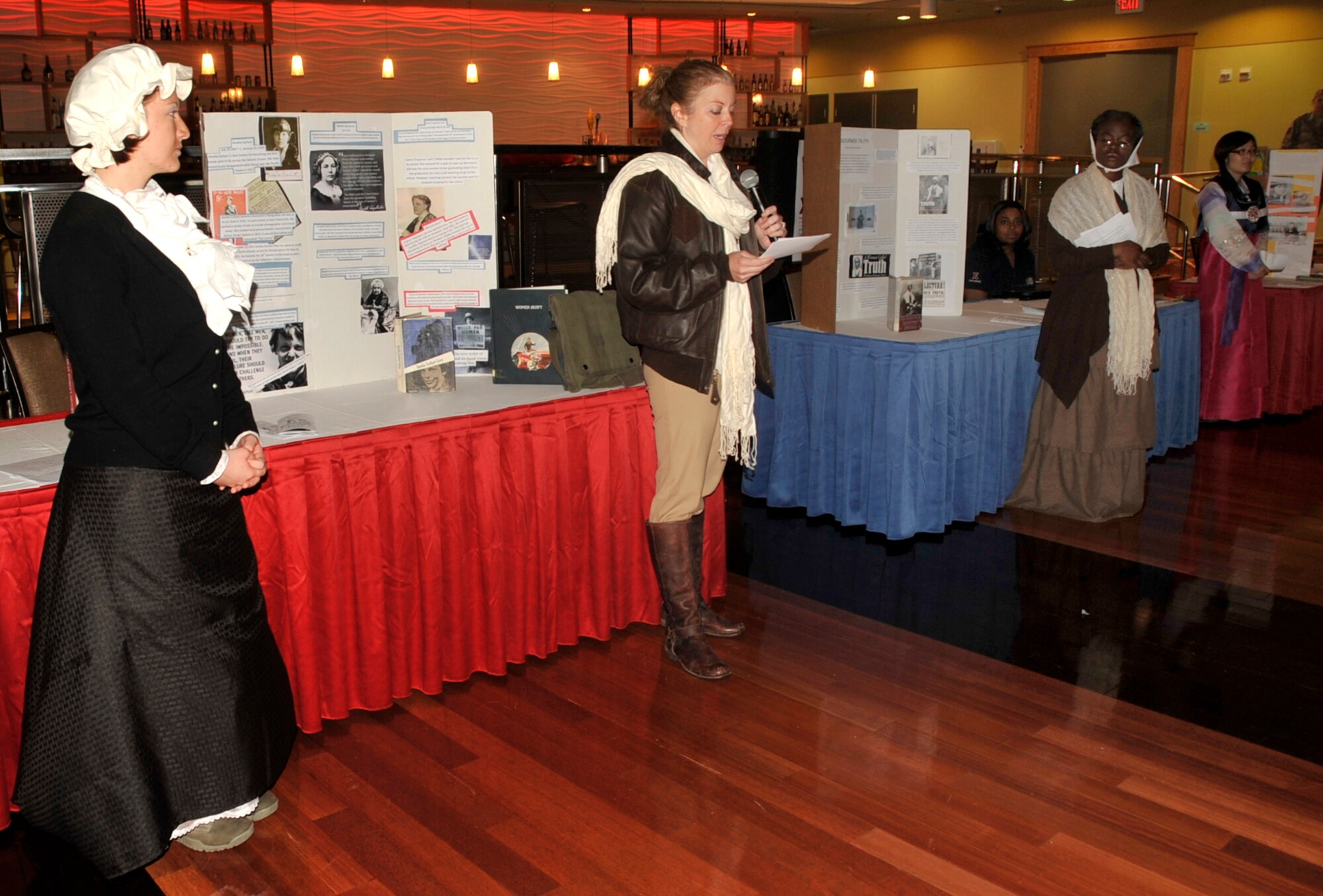 Air Force members and spouses portray historical women at a Women’s Equality Day Event, Osan Air Base, Republic of Korea, Aug. 23, 2013.  The event commemorates the day women in America were given full voting rights under the U.S. Constitution by the passage of the 19th Amendment.  (U.S. Air Force Photo/Tech. Sgt. Micky M. Bazaldua)