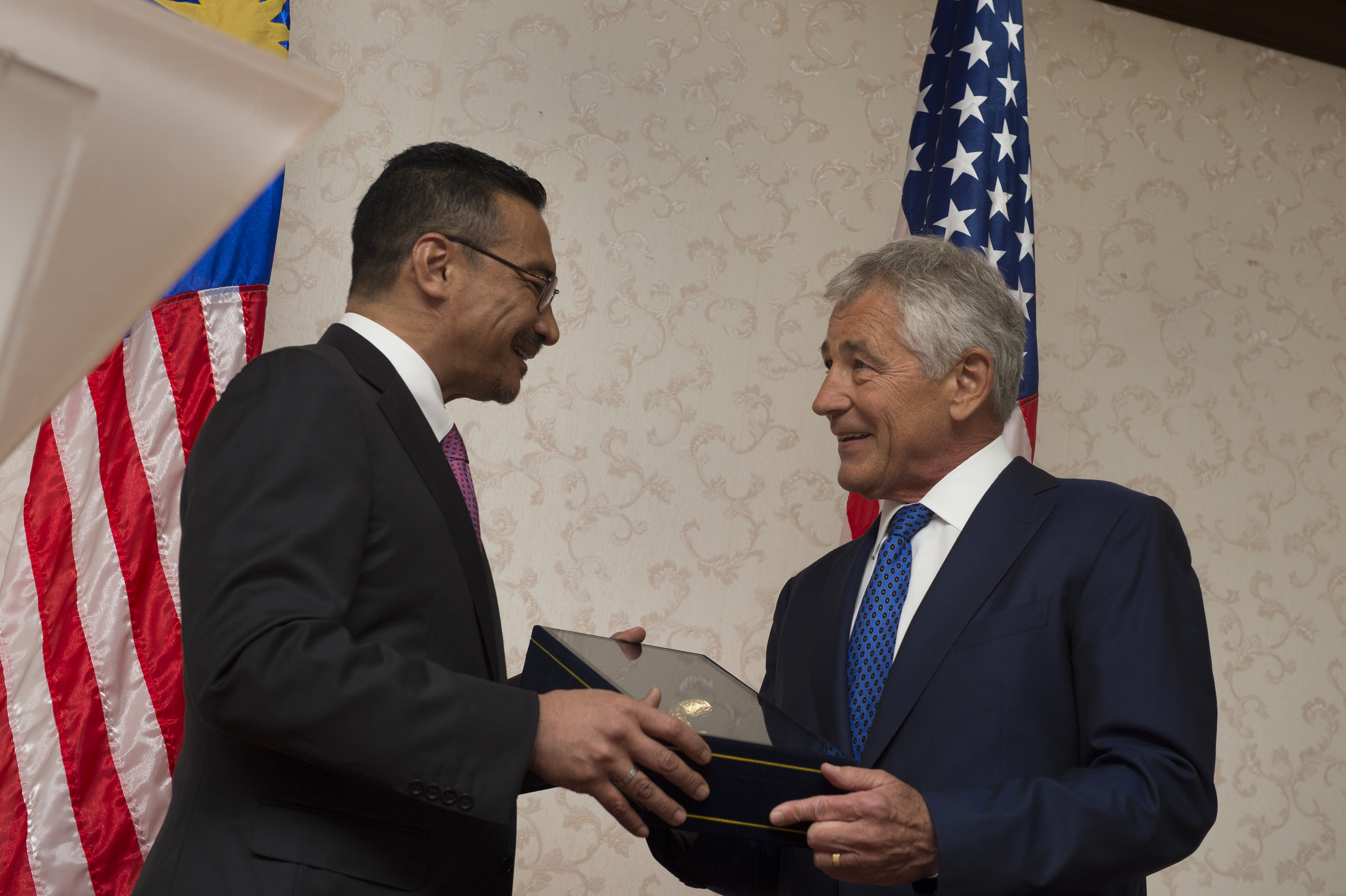 U S Defense Secretary Chuck Hagel And Malaysian Defense Minister Hishammuddin Tun Hussein Exchange Gifts After They Hosted A News Conference At The Pura World Trade Center In Kuala Lumpur Malaysia Aug 25 2013