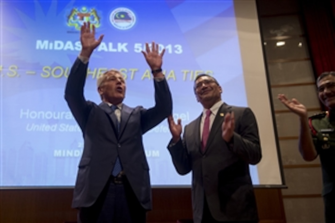 U.S. Defense Secretary Chuck Hagel thanks attendees after delivering a speech at the Malaysian Institute of Defense and Security in Kuala Lumpur, Malaysia, Aug. 25, 2013.  